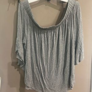 Knit 3/4 sleeve top. White bow in back.